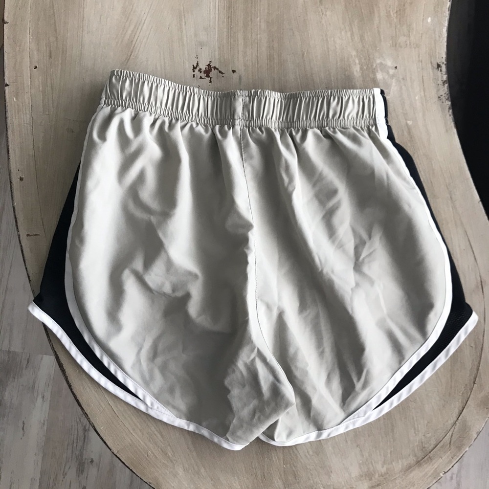 tan/white nike shorts small